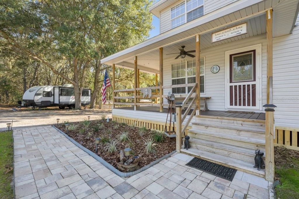 Photo of 240 Whirlwind Loop, Hawthorne, FL 32640 (MLS # GC536833)