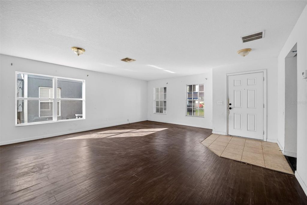 Photo of 512 Flower Fields Lane, Orlando, FL 32824 (MLS # O6379201)