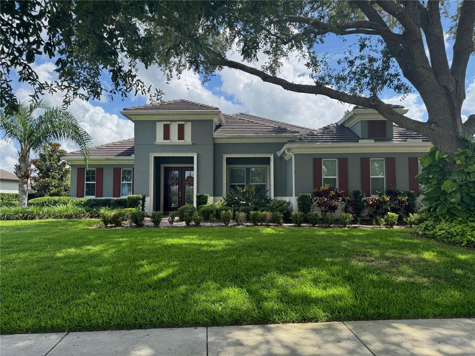 Beautiful family pool home perfect for multi-generational living located on the 3 rd hole of
the 18-hole golf course in the highly sought after Redtail Community, with 5 bedrooms
and 4 ½ baths in the main house. The open floor plan is large, yet warm and inviting.
Each of the 4 bedrooms in the main home has its own En Suite bathroom with one serving as a pool bath.
Speaking of pools, this one has it all: pebble surface, sun-shelf with a built-in umbrella
stand. A whirlpool and fountains enhance the beauty of this screened in Lanai with
plenty of room for social time. The kitchen has granite counters, a 15-foot kitchen island
with seating for six or more, top of the line GE Café refrigerator and other GE
appliances and is large enough for multiple chefs. The kitchen opens into the large
Great Room with 14-foot ceilings and plenty of space for entertaining indoors. The
ceramic tile entry opens to an office fitted with a murphy bed on one side and a dining
room sized to host holiday gatherings. You will have no worries about storage with the
oversized “Costco Closet” with plenty of space for your home supplies, small or large.
Retreat to the Master Suite, with 12-foot tray ceilings, a large walk-in closet with custom
designed storage and master bath with double-sinks, a large tub and rain shower.
An incredible detached 1/1 Casita has a magnificent kitchen, glass fireplace in the living
area and even has a dog washing station in the laundry room. Perfect for a college-
aged son or daughter, your parents or live-in caretaker. It has 2 large fully opening
sliding glass doors which open to the pool area. The entrance even boasts its own
private garden area.
The three-car garage is fitted with two EV chargers for electric vehicles with access to a
large attic space with finished floor for storage and a Bluetooth-enabled SPAN electrical
panel. Stay wired throughout the home with a Qbox that can route direct internet
connections to all bedrooms, the office and living room in the main house.
The house comes with a 73-panel solar power system, with two backup batteries that
will keep your home powered during any blackout and will offset your power bill
throughout the year. Panel system is leased, which is fully-transferrable and warranted
for all repairs throughout the life of the system.
Due to windstorm damage, a new roof is being replaced the end of July. $325 monthly
HOA fee (which is paid in quarterly installments) includes gated access and community
maintenance. In addition, there is a $150 monthly membership fee that includes
clubhouse access with fitness center, pool, and a $50 food credit to the large dining
room.
We invite you to join serene living in this peaceful 300+ house gated community