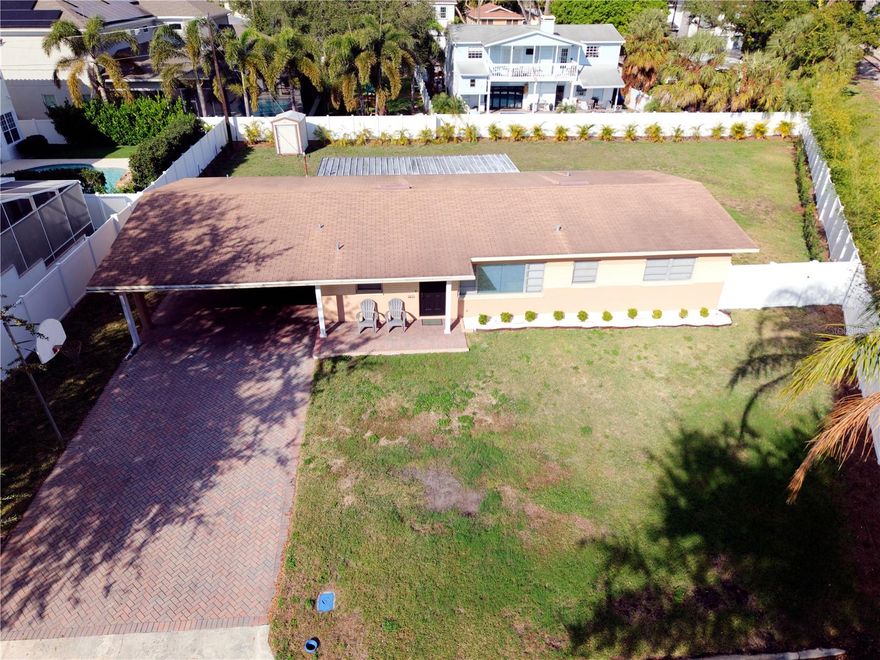Come build your masterpiece on this massive, oversized 13,800 SF lot in great South Tampa neighborhood.  Property is located on dead-end street, one block from highly rated Roosevelt Elementary.  No tree issues and value is in the land.  Build large home with in-law/teen suite, casita, mancave/she-shed, workshop, oversized garage-possibilities are endless.  Existing home is a 3BR/2BA ranch that has recently received updates in 2025, including: new HVAC system, hot water heater/tank, luxury vinyl plank flooring, interior paint, quartz countertops, fixtures.  Located in flood zone X, high and dry, and no issues with flooding from 2024 hurricanes.  Currently zoned RS-60.   Close to all Tampa hotspots: Bayshore Blvd, Midtown, Water Street, Marina District and Hyde Park.