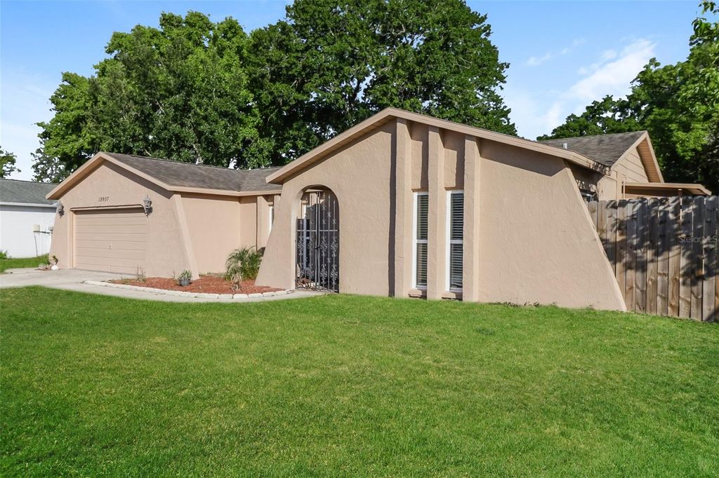 Photo of 12907 Cedar Ridge Drive, Hudson, FL 34669 (MLS # O6403759)