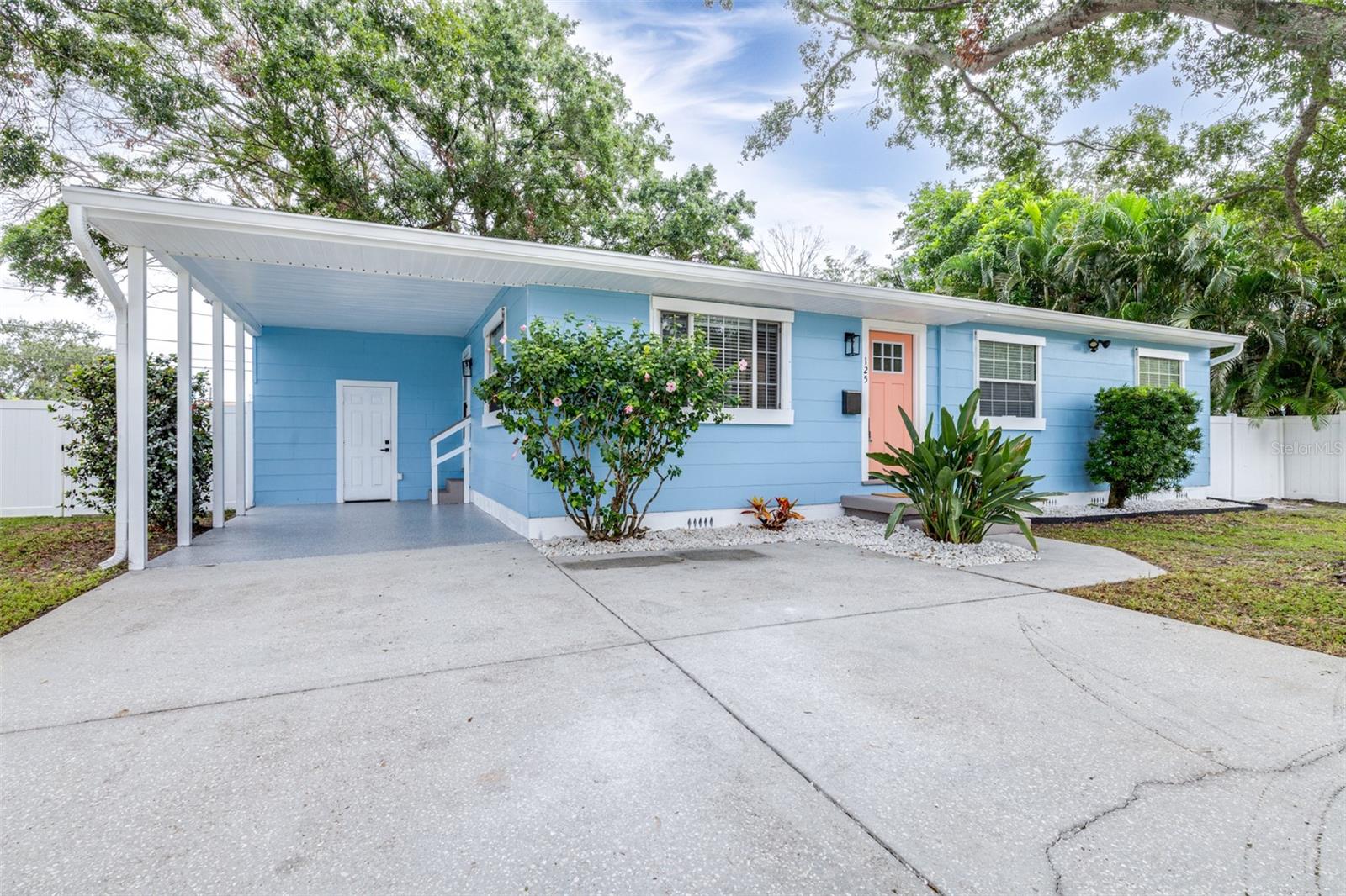 Welcome to this MOVE-IN READY, fully remodeled 3-bedroom, 2-bathroom home on nearly a quarter-acre in the heart of North Saint Petersburg! From the moment you arrive, the quiet street and mature oaks invites you in, and once inside, you’ll be welcomed by a spacious living area filled with natural light. The beautifully updated kitchen is the centerpiece of the home, featuring a farmhouse sink, quartz countertops, solid wood cabinetry, and new stainless-steel appliances and ZLINE microwave drawer—perfect for both everyday living and entertaining. All three bedrooms are located on one side of the home, with the master bedroom with ensuite bathroom complete with a fully tiled shower. Step outside to your massive, fully fenced backyard, where a huge patio creates the perfect space for gatherings, barbecues, or simply relaxing in your own private oasis. The property has plenty of on-site parking, so bring your cars, boats, or RV. The home boasts a 2025 roof and plenty of other updates and is ideally located just minutes from Riviera Bay, Rio Vista Park, Weedon Island Preserve, and 4th Street’s shops and restaurants. With downtown St. Pete, I-275, and the Gandy Bridge all close by, commuting to Tampa, Clearwater, or the beaches is a breeze. Don’t miss the opportunity to own this stunning, updated home in a prime location—schedule your private showing today!