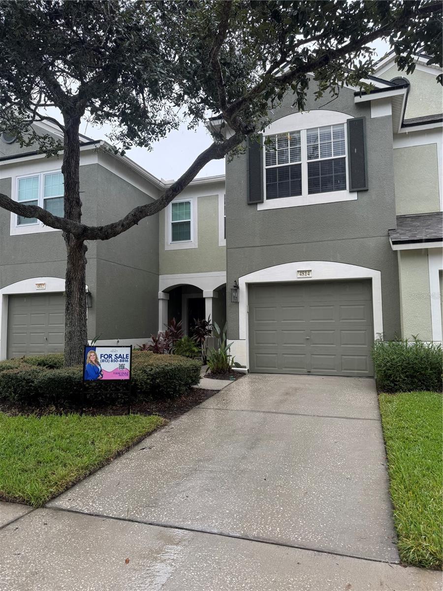 One or more photos have been virtually staged. This beautifully updated 3-bedroom, 2.5-bath townhome with a 1-car garage offers one of the community’s most premier locations—nestled along tranquil water views that bring both peace and convenience.Step inside to find a bright, open floor plan with fully remodeled bathrooms, a brand-new kitchen with stainless steel appliances, and updated first-floor flooring. The 2-year-old roof, water heater, and A/C unit are fairly new, adding extra peace of mind, while the warm wood cabinetry and eat-in kitchen nook create the perfect spot for your morning coffee.The living and dining areas flow seamlessly to a screened-in back patio. A perfect place to unwind while enjoying the calming sights of nature. Curb appeal shines with the accented front porch, adding charm to the exterior. Upstairs, the spacious primary suite feels like a private retreat, complete with a double-vanity bath and serene water views to wake up to every day.Valhalla’s HOA covers water, cable, internet, landscaping, exterior maintenance, and even twice-a-year pressure washing—giving you true low-maintenance living. With unbeatable location near Tampa, Brandon, major highways, dining, and shopping, this home is the perfect mix of comfort and convenience.It won’t last long—schedule your private showing today!