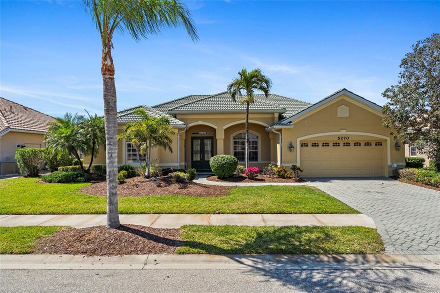 Welcome to 5270 White Ibis Drive, a stunning residence nestled within the highly sought-after gated community of Heron Creek Golf and Country Club in North Port, Florida. This beautifully designed home offers a perfect blend of luxury, comfort, and functionality, featuring 3 spacious bedrooms, 3 full bathrooms, and a versatile den ideal for a home office or study. With over 2,700 square feet of living space, the split and open floor plan is enhanced by elevated ceilings throughout, including elegant tray ceilings in the bedrooms, creating an airy and inviting ambiance.

The heart of the home is the gourmet kitchen, which seamlessly overlooks the family room and boasts solid wood cabinetry, granite countertops, a center island, stainless steel appliances, and a built-in oven—perfect for both everyday living and entertaining. The primary suite is a private retreat with expansive custom walk-in closets for both him and her, and a luxurious en-suite bath. Every window throughout the home is adorned with classic plantation shutters, and custom sliding hurricane shutters enclose the entire patio for peace of mind, along with hurricane protection for all exterior windows.

Step outside to your own personal oasis featuring a private pool and spa, a spacious covered lanai, and an additional open patio area perfect for sunbathing or relaxing with guests. The outdoor kitchen is fully equipped with a grill, refrigerator, sink, and more, making it ideal for hosting gatherings year-round. Additional highlights include a separate laundry room with a utility sink and an oversized two-car garage offering ample storage space.

Residents of Heron Creek enjoy access to exceptional community amenities, including a 27-hole championship golf course designed by Arthur Hills, a state-of-the-art fitness center with saunas and locker rooms, a resort-style pool and spa with a sun deck, pristine tennis courts, and a 21,000-square-foot clubhouse offering a restaurant, café, and event spaces for banquets and weddings. With three different membership packages available, there’s an option to fit every lifestyle.

Conveniently located near world-renowned beaches, top-rated restaurants, shopping destinations, and with quick access to I-75 for easy commuting, this home offers the perfect balance of luxury and location. Don’t miss the opportunity to make this exceptional property your own.