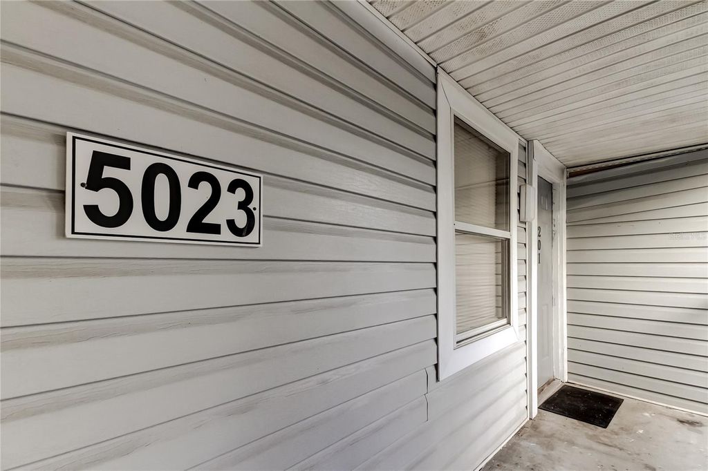 Photo of 5023 Terrace Palms Circle #201, Tampa, FL 33617 (MLS # TB8463406)