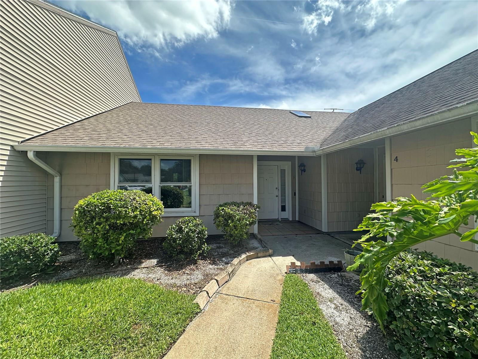 This turnkey 2/2 in Persimmon Place loaded with upgrades—new roof, HVAC, and water heater (2021), new windows, Vivint security with cameras & Ring doorbell, and all new kitchen appliances (2022). Features remodeled baths, updated floors, real brick backsplash, breakfast bar, indoor laundry, new slider to private patio, and outside storage. Prime location just minutes to the beach, downtown, shopping, and parks!