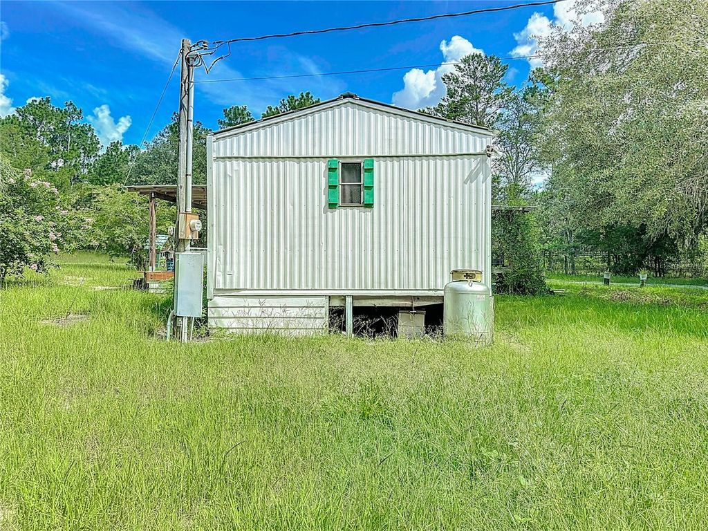 Photo of 5391 Jenkins Loop Dr, Keystone Heights, FL 32656 (MLS # GC537378)