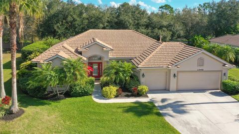 Photo of 13046 Peregrin Circle, Bradenton, FL 34212 (MLS # A4671651)