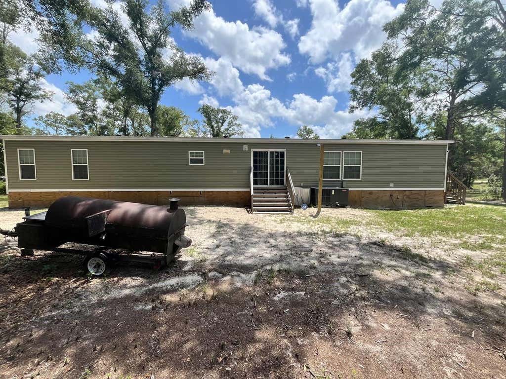 Photo of 21619 41st Drive, Lake City, FL 32024 (MLS # O6427130)