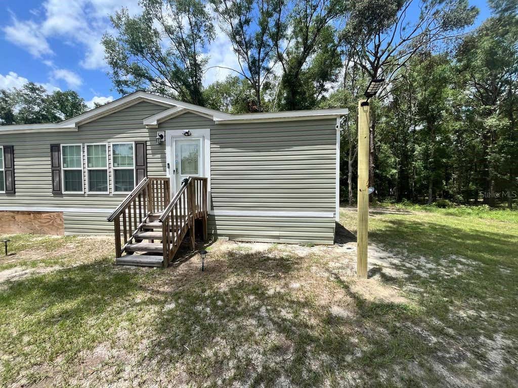 Photo of 21619 41st Drive, Lake City, FL 32024 (MLS # O6427130)