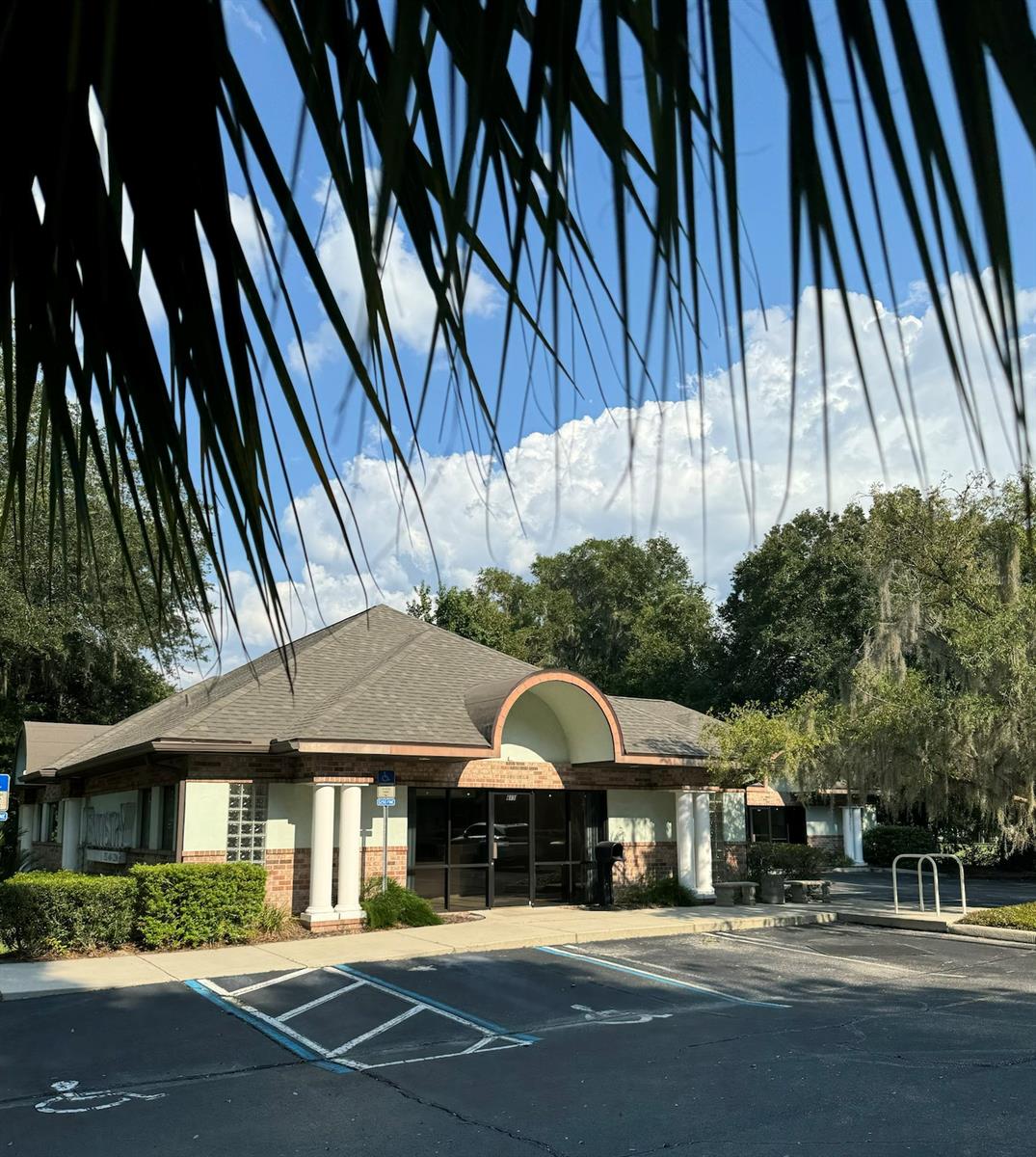 You will we amazed once you view this stellar property located in the desirable NW portion of Gainesvillle, Florida. Previously utilized as a dental office with 10 spacious operatories, extensive labs both wet and dry, sterilization area with room for expansion, 3 full baths with showers included, 2 half-baths, 3 doctor offices, staff kitchen, enormous reception area and large capacity waiting room. This interior invites any professional business to work comfortably including medical, veterinary, laboratory, lawyers, accountants and shared businesses. The list of uses is endless as it can be easily designed to fit any venture. With ample storage closets and cabinets, there will always be room for keeping materials safe, handy and clean. Upon entry, it is viewed as a spacious and clean office with a large welcoming reception area, all with light walls and durable tile floors. Don't miss out on this incredible opportunity! New roof installed 10/2022, Keyless entry, all LED lights interior and exterior, 5 Nest thermostats, 2 air purifiers installed 2020 (Blue light), large code compliant marquee on street side entry to property, curb parking lot with extra parking included than required by code (24 spaces), pleated filters for all 5 a/c units, extra safety interior dead bolt locks on all exits except keyless rear entry, hard-wired for computer and phone lines, pull-down ladder to spacious attic with stand-up overhead space to access air conditioning units, insulated utility room for suction, compressors and exterior light timers, 2 exterior safety light poles by GRU as well as LED lights installed around entire building under eaves, concrete pad for waste or recycle easily accessible by dump truck. Water shut-off valve to entire building. All original complete floor plans remain part of the property and will be helpful for any changes planned in the future. Interior spaces can be combined to form larger workspaces. This office boasts 2 store-front entries allowing space to be divided into 2 offices with separate entrances. Washer/dryer hook-up, all windows with treatments, employee lounge with full refrigerator space, cabinets and built-in dining/worktable. Ceiling fans throughout. There is even a slot on the front door to place personal envelopes or mail not delivered by USPS. Many extra detailed surprises included and ready for viewing!
