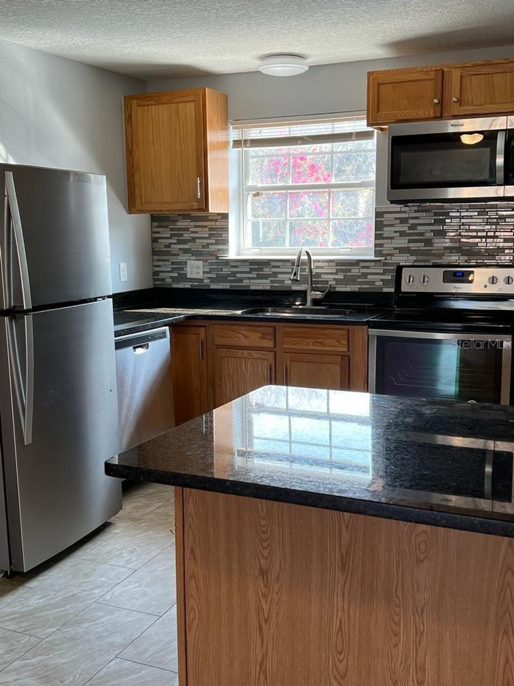 Photo of 4392 Lake Underhill Road #22C3, Orlando, FL 32803 (MLS # O6401955)