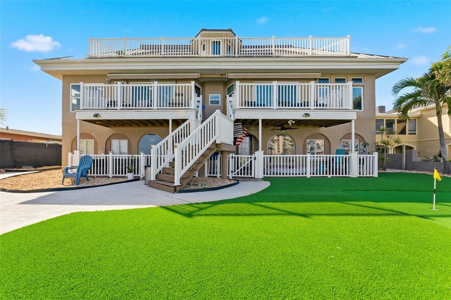 Welcome to 220 126th Ave Unit 1, a beautifully reimagined waterfront condo nestled in the highly sought-after Isle of Capri community of Treasure Island. This spacious two bedroom, two full bathroom, and one half bathroom residence has been thoughtfully remodeled from top to bottom, delivering a move-in ready coastal retreat where modern elegance meets the relaxed Florida lifestyle.
From the moment you step inside, you are welcomed by an open, light-filled layout adorned with large format tile flooring throughout, quality finishes, and a clean contemporary aesthetic. The updated kitchen showcases sleek stainless steel appliances, generous cabinetry, and a seamless flow into the main living area, perfect for entertaining guests or savoring quiet evenings at home.
The connection to the outdoors is truly one of this home's most captivating qualities. An enclosed waterfront living space just off the main living room offers serene water views and a beautifully maintained backyard complete with a charming putting green, your own private slice of paradise. A separate covered paver porch exclusive to this unit provides yet another space to unwind with your morning coffee or catch the coastal breeze as the sun sets over the Gulf.
For water enthusiasts, this property is nothing short of exceptional. A private assigned boat slip features a floating dock designed to accommodate two jet skis, offering effortless anytime access to the open water. The sale includes a jet ski, trailer, and floating dock, making this a rare turnkey opportunity to enjoy the water from day one.
A private one car garage and a separate locked storage shed provide generous space for beach gear, water equipment, and everything the Florida lifestyle demands. The location places you just minutes from Johns Pass, where you can enjoy waterfront dining, shopping, live entertainment, and easy access to some of the most stunning beaches on the Gulf Coast.
Whether you are searching for a primary residence, a vacation escape, or an investment property, this condo offers compelling flexibility with rental potential subject to local leasing guidelines. The HOA includes flood and wind insurance, simplifying ownership and helping to reduce ongoing expenses. This is more than a condo. It is a complete waterfront lifestyle, with peaceful mornings on the water, spontaneous days out on your jet ski, and evenings spent entertaining in a beautifully updated space that feels like a permanent vacation. Schedule your private showing today and experience it for yourself.
