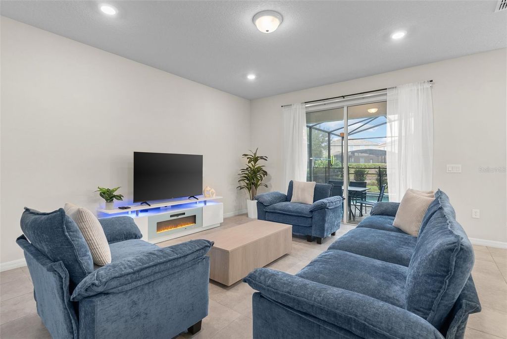 Photo of 7247 Oakmoss Loop, Davenport, FL 33837 (MLS # P4938051)