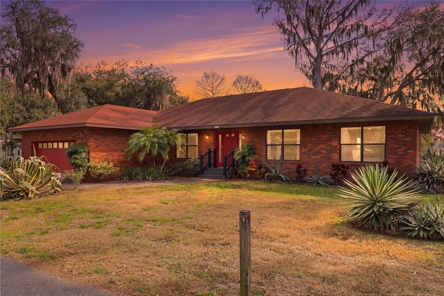 Eligible for USDA loan! Quiet rural mixed property types. HUSHED PRIVACY, INCREDIBLE VISTAS on the open waterfront of Lake Tsala Apopka.This well-maintained 4-bedroom, 2-bath, 2-car garage red brick home offers over 2,500 square feet of wide-open living space with soaring vaulted ceilings and walls of windows framing breathtaking lake views and unforgettable sunsets.The main living area flows effortlessly—great room, dining, kitchen, dinette, and breakfast bar—all opening to a massive deck overlooking the water. Tile and laminate flooring run throughout, and the home’s thoughtful layout delivers six rooms with a view. Built in 1998 (effective age 2003). Outside, enjoy a manicured yard shaded by mature oak trees, a private 16-foot dock for boating and fishing, and plenty of room for all the toys with a boat or RV pad. Nest Cameras and Security Lighting on lakeside. The oversized garage includes a workshop for projects and storage.Practical perks abound:  Additional fencing $7k, Heating / Cooling $12k (Jan 2026) Whole Home Water Filtration/Purifier & Softener, New Stove and Refrigerator, New Freezer in garage, Custom in glass pet door for glass sliders, New roof 2017, Whole-house Generac back up generator with dedicated LP propane tank - never be without power, Quiet Cul-de-sac location, Convenient to downtown Inverness. Open waterfront living at its finest.As they say—if you’re too busy to fish, you’re just too darn busy.Fish or cut bait, y’all. Lake life is calling