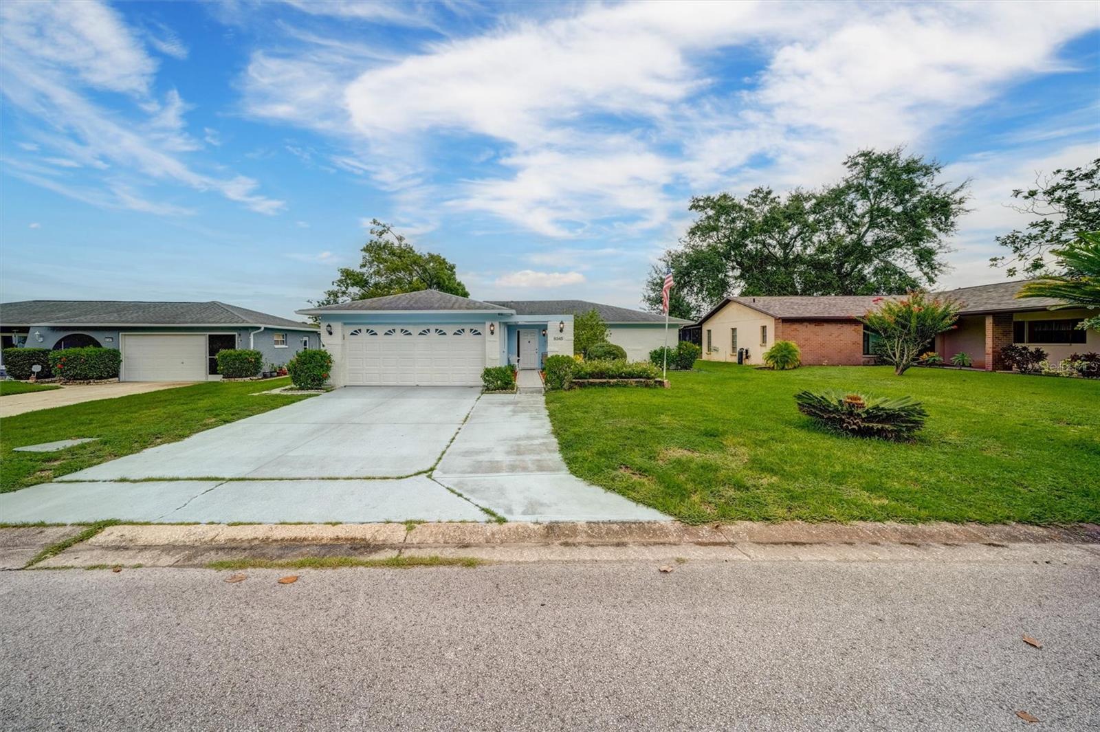 Welcome to TIMBER OAKS, 55+ Community. This one-story BLOCK Single house with no rear neighbors has
2 bedrooms, 2 baths, and a 2-Car Garage. Tile flooring throughout the kitchen, dining area and bathrooms. Wood laminate in bedrooms and living room. Kitchen and baths are completely remodeled. Garage is set up with storage and room for two cars. The Timber Oaks Community has a clubhouse which hosts many activities, as well as a pool, tennis / pickle ball courts, bocci and shuffleboard courts. All the amenities for a $55 per month HOA fee. Come see this home today!