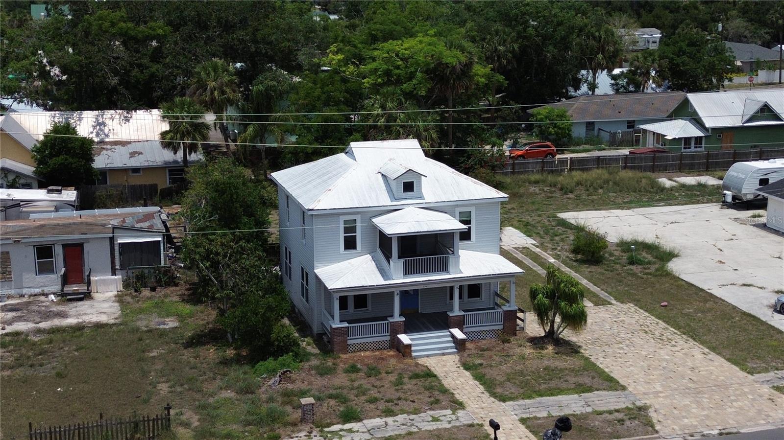 Historic Florida Home, high ceilings, and lots of spacious rooms. Large kitchen with tile floor and island for food-prep and a eat-in bar. Large dining room with wood style flooring throughout the first floor. Four (4) bedrooms on the second floor. A unique screened balcony overlooks the neighborhood and makes for a great place to relax. There's a tool shed for storing your stuff. The driveway is paved with brick pavers. There's also a well that was possibly for irrigation. Have you always dreamed of owning a historic home in historic Arcadia? Make your dream come true and come see the potential!