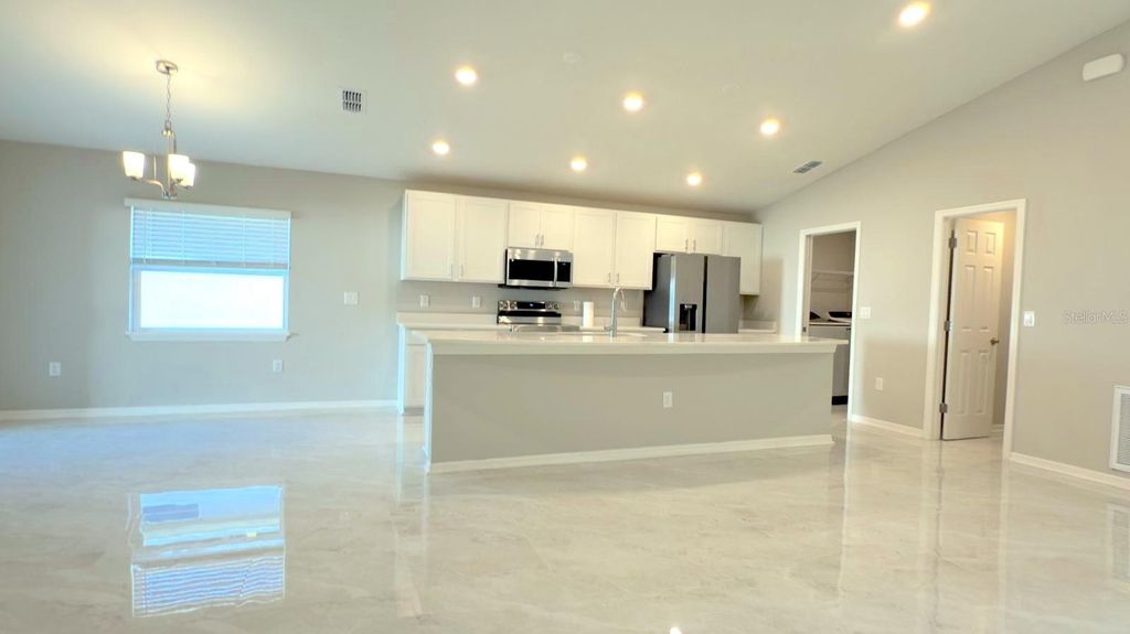 Photo of 1551 Eucalyptus Way, Davenport, FL 33837 (MLS # O6402823)