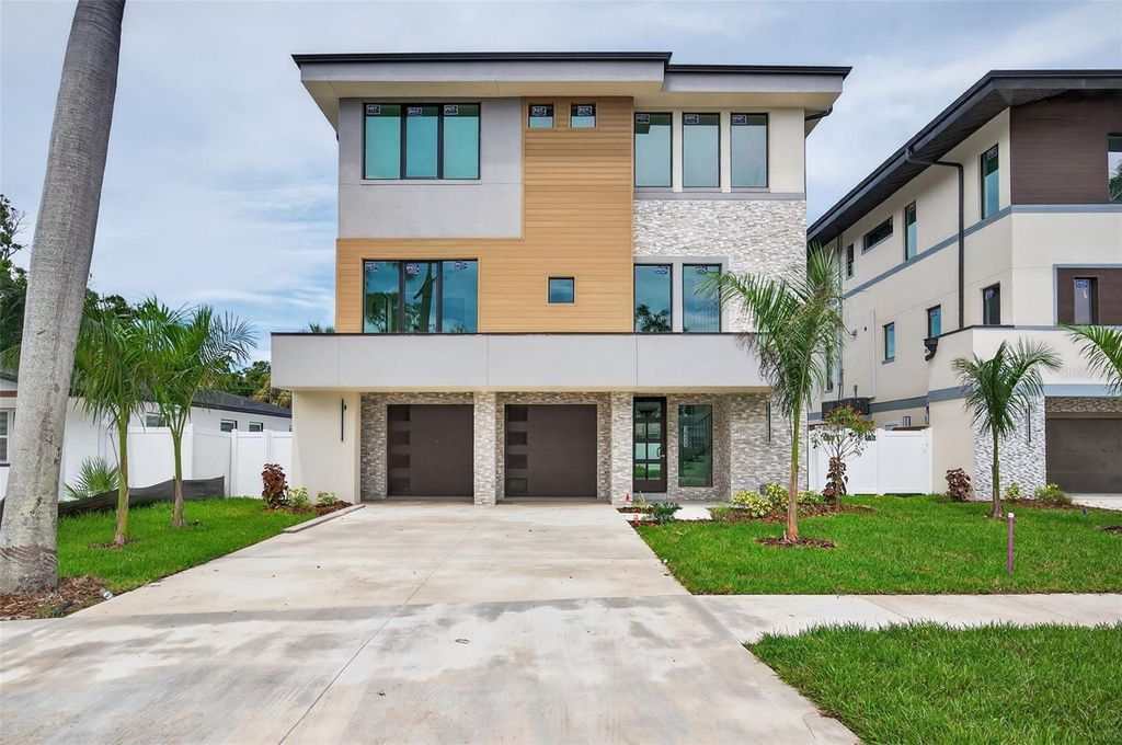 Photo of 721 Mandalay Avenue, Clearwater Beach, FL 33767 (MLS # TB8376600)