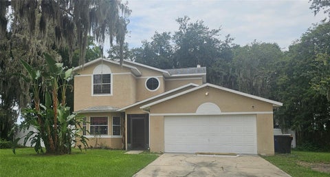 Photo of 1588 Cypress Woods Circle, Saint Cloud, FL 34772 (MLS # S5154522)