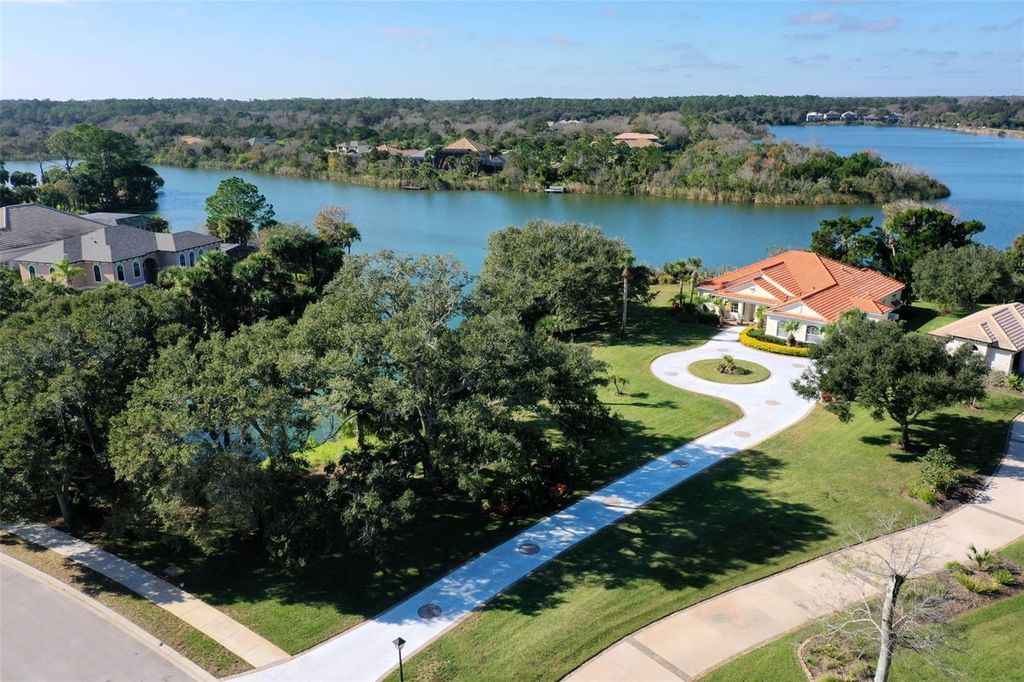 Photo of 10 Heron Drive, Palm Coast, FL 32137 (MLS # FC314568)