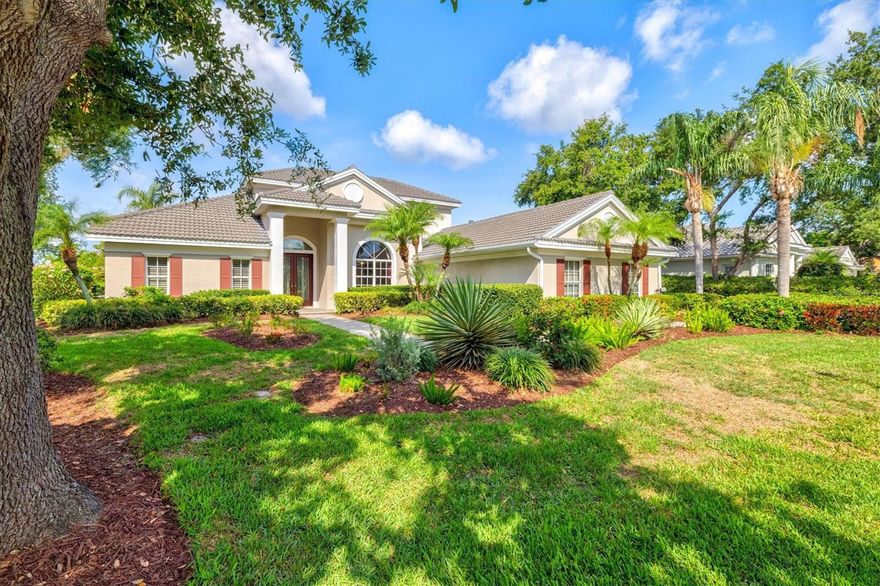 One or more photo(s) has been virtually staged.  Welcome to Silver Oak Estates, an exclusive, gated enclave nestled within Palmer Ranch. This custom-built John Cannon residence offers refined luxury, timeless design, and serene natural beauty, all situated on one of the community’s most coveted lakefront lots. Boasting 4 spacious bedrooms, a private office and a versatile bonus/game room, this thoughtfully designed home provides exceptional living space for both everyday comfort and entertaining. As you enter the grand foyer, you’ll be greeted by tall ceilings, intricate crown moldings and custom millwork, a hallmark of the quality craftsmanship that defines John Cannon Homes. The living room features sliding glass doors that seamlessly open to a screened salt water pool and expansive lanai offering unobstructed views of the shimmering lake and lush preserve. A formal dining room sits opposite the well appointed kitchen designed for the culinary enthusiast with granite countertops, stainless steel gas range, refrigerator and an oversized breakfast bar. A custom walk in wine room with built-in bottle storage is ideal for wine collectors. Beyond the kitchen is the family room surrounded by sliding glass doors illuminating the room with natural light. The primary suite offers tranquil lake and preserve views, direct access to the lanai and pool. Work from home in a richly appointed office with hardwood floors, custom built-ins, and captivating lake views. Head upstairs to enjoy the bonus room fully equipped with a wet bar, mini-fridge, pool table, full bathroom and an oversized balcony overlooking the lake and preserve! Located just minutes from the gorgeous beaches on Siesta Key and Casey Key, downtown Venice, top-ranked schools including the highly acclaimed Pine View School, world-class golf, Costco, Potter Park YMCA, The Legacy Trail plus convenient I-75 access, this residence offers an unparalleled lifestyle in one of Sarasota’s finest communities!