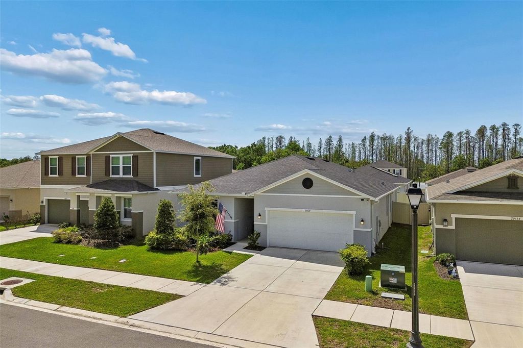 Photo of 20121 Azul Marble Loop, Land O Lakes, FL 34638 (MLS # TB8492775)