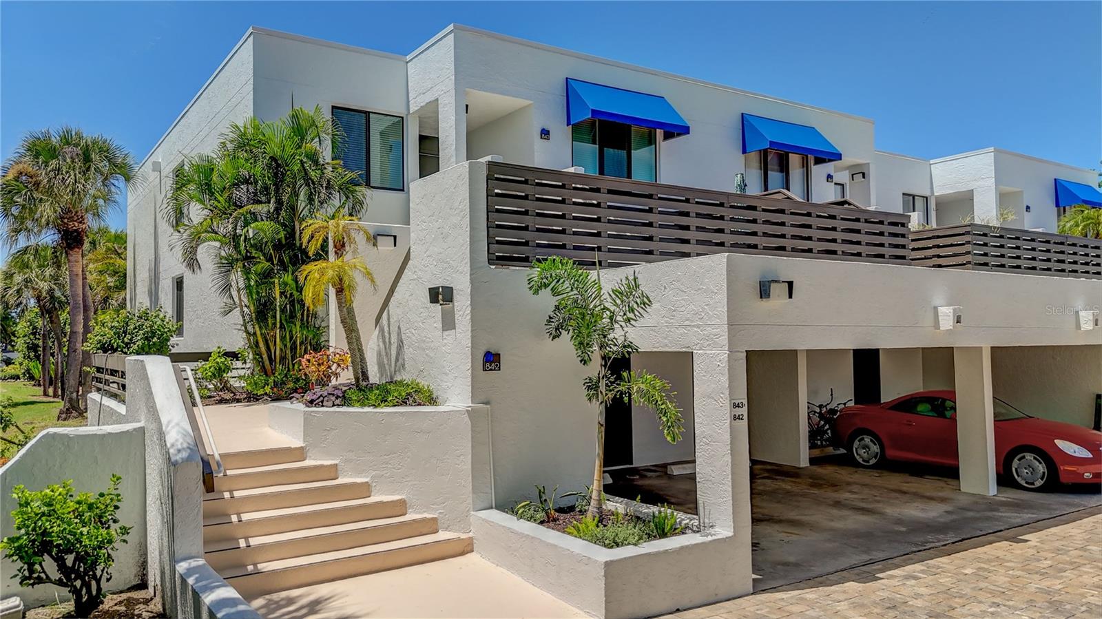 Looking for an extended Longboat Key getaway? This well appointed corner condo in Bayport Beach and Tennis Club has everything for carefree, comfortable island living. Ideal as a 7-12 month rental. Located on the first level in the private 800 "cluster", the spacious, living area opens out to a screened lanai and large outdoor patio overlooking landscaped grounds. Enjoy this serene space for relaxing, entertaining, or reading a good book. There is a gas grill for al fresco meals and a patio gate out to the grounds. The primary bedroom has a king bed, ensuite bath, large walk-in closet, and an alcove with a desk overlooking the garden. A second bedroom is currently set up with a king bed but can easily be converted to two twins. There is one covered parking space and a locked storage closet under the unit, plus plenty of guest parking.
Bayport Beach and Tennis Club is a Gulf-to-Bay community, conveniently located mid-key with award-winning design and fantastic amenities. Residents and guests enjoy a heated, Jr Olympic pool, private fishing pier, kayak and paddleboard launch, tennis courts, club house with full kitchen and fitness room, plus access to 1,200 feet of private beach with beach chair set-up.
Publix, parks and other amenities are within 2-3 miles, with shopping and terrific dining dotted along the Key. Sarasota's entertainment and cultural attractions are a short drive away. This condo may be rented short term with a three month minimum during season (January through April), at $7800 per month. Tourist tax is applied to stays less than 6 months.