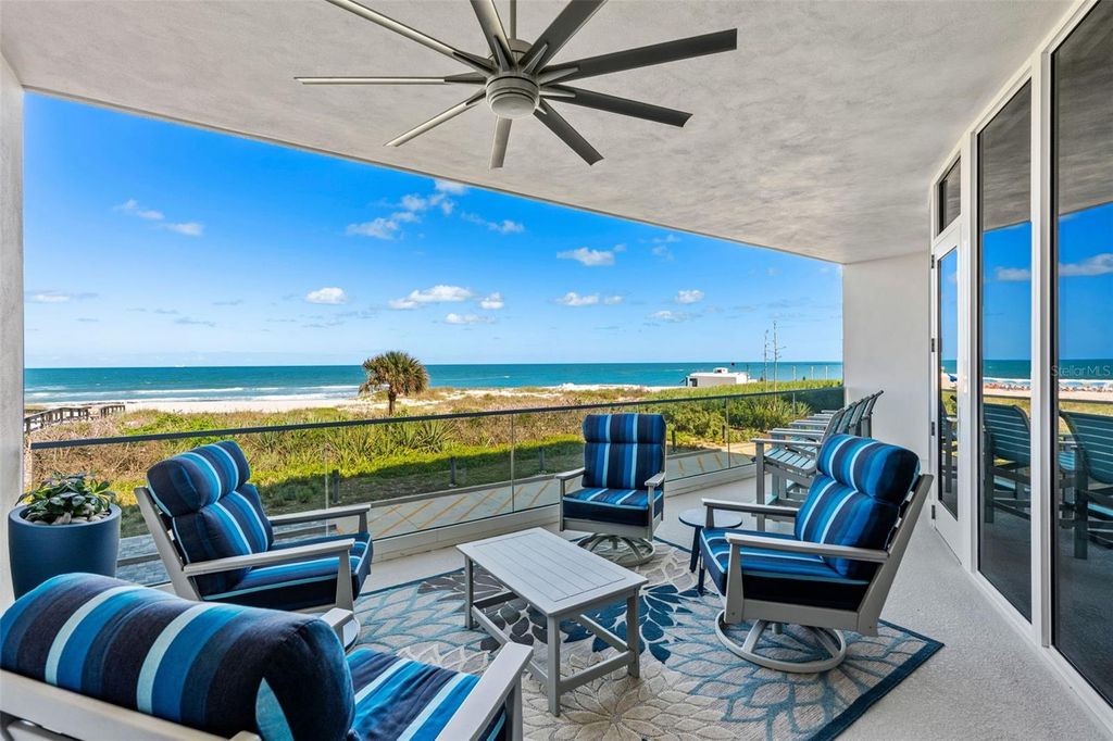 Photo of 65 N Atlantic Avenue #205, Cocoa Beach, FL 32931 (MLS # O6419218)