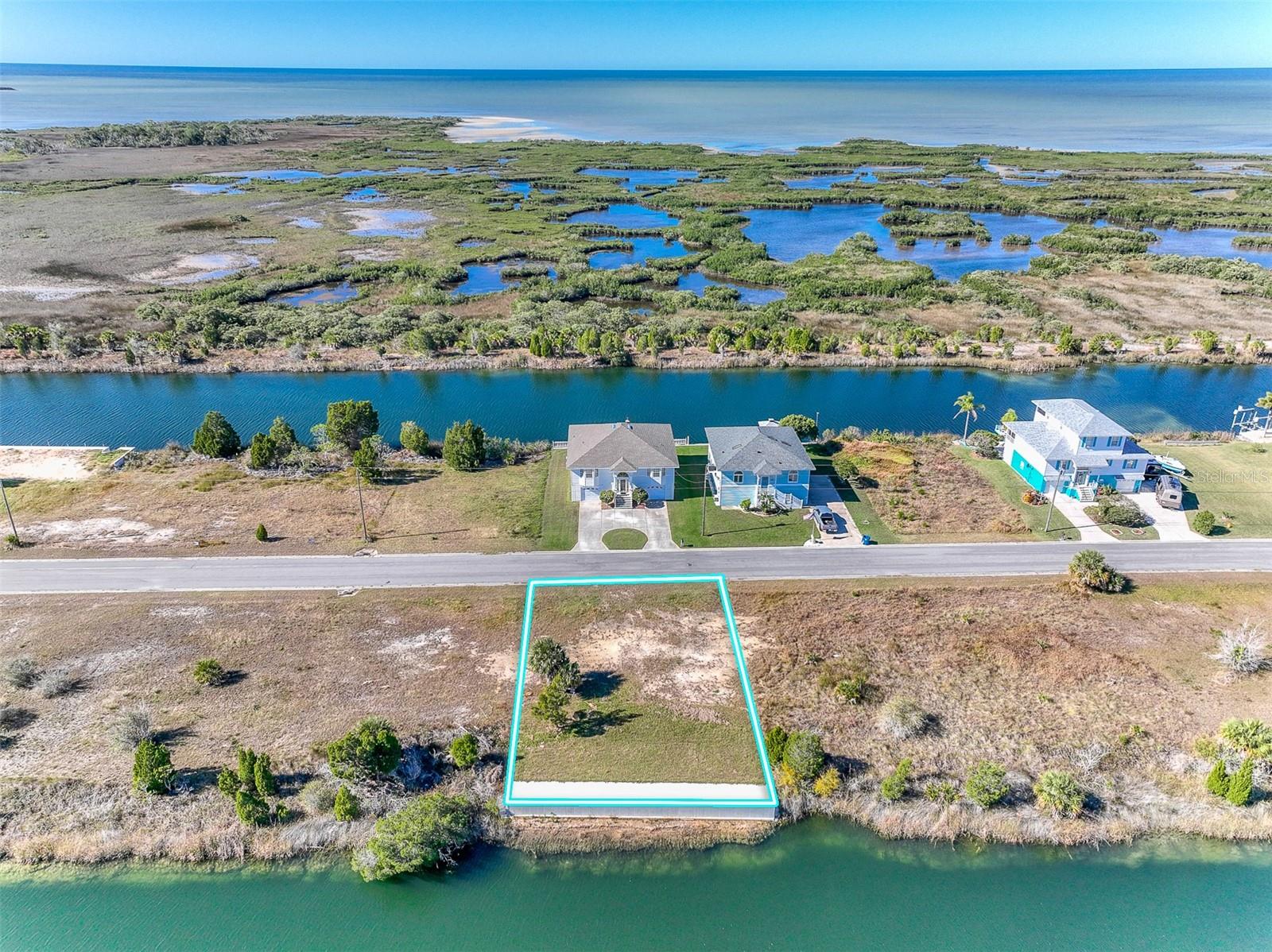OWNER FINANCING AVAILABLE! Build your dream home with STUNNING OPEN WATER GULF VIEWS! This oversized 7,100 SF lot in desirable Hernando Beach comes fully prepped with a brand-new 4' seawall and 8' cap, saving you time and money. Zoned R1B for a single-family home, the property offers NO HOA or deed restrictions, and short-term rentals are allowed—perfect for a vacation home or investment opportunity.
Located across from 3267 Lugustrum Drive, the lot has water, sewer, and power at the street, ready for hookup. As it's in a flood zone, homes must be elevated—ideal for maximizing those panoramic Gulf vistas.
Live the ultimate Florida lifestyle in golf-cart friendly Hernando Beach, just minutes from Weeki Wachee Springs. Enjoy boating, kayaking, paddleboarding, snorkeling, fishing, and more. Convenient to shopping, dining, top-rated schools, hospitals, and with easy access to the Suncoast Parkway for quick trips to Tampa or Brooksville.
Don’t miss this chance to own a slice of waterfront paradise—bring your builder and vision today!