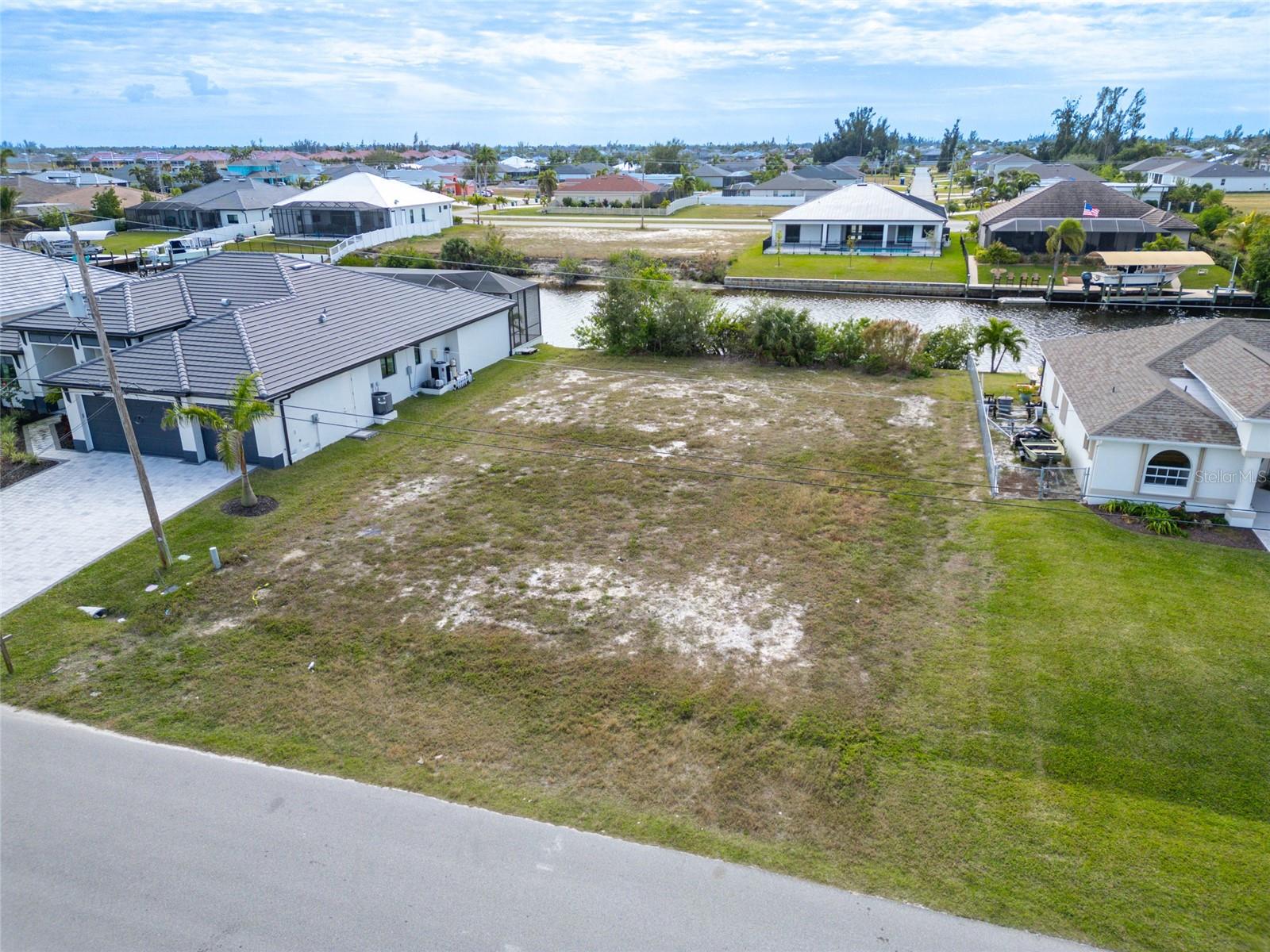 Ready to Build Your Dream Home! Perfect lot for builders to build a market home. This lot is easy access to open water. New Construction has been and is building prestigious homes with value. This lot has city sewer and water available. Back of your future home faces South. Close to shopping, parks, restaurants Pine Island, Matlacha and more.