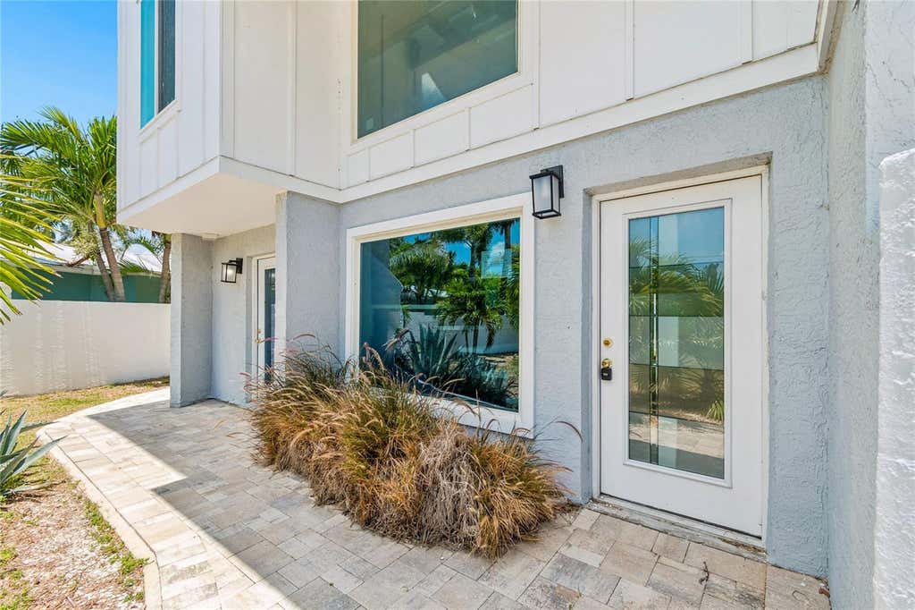 Photo of 970 Boca Ciega Isle Drive, St Pete Beach, FL 33706 (MLS # TB8522190)