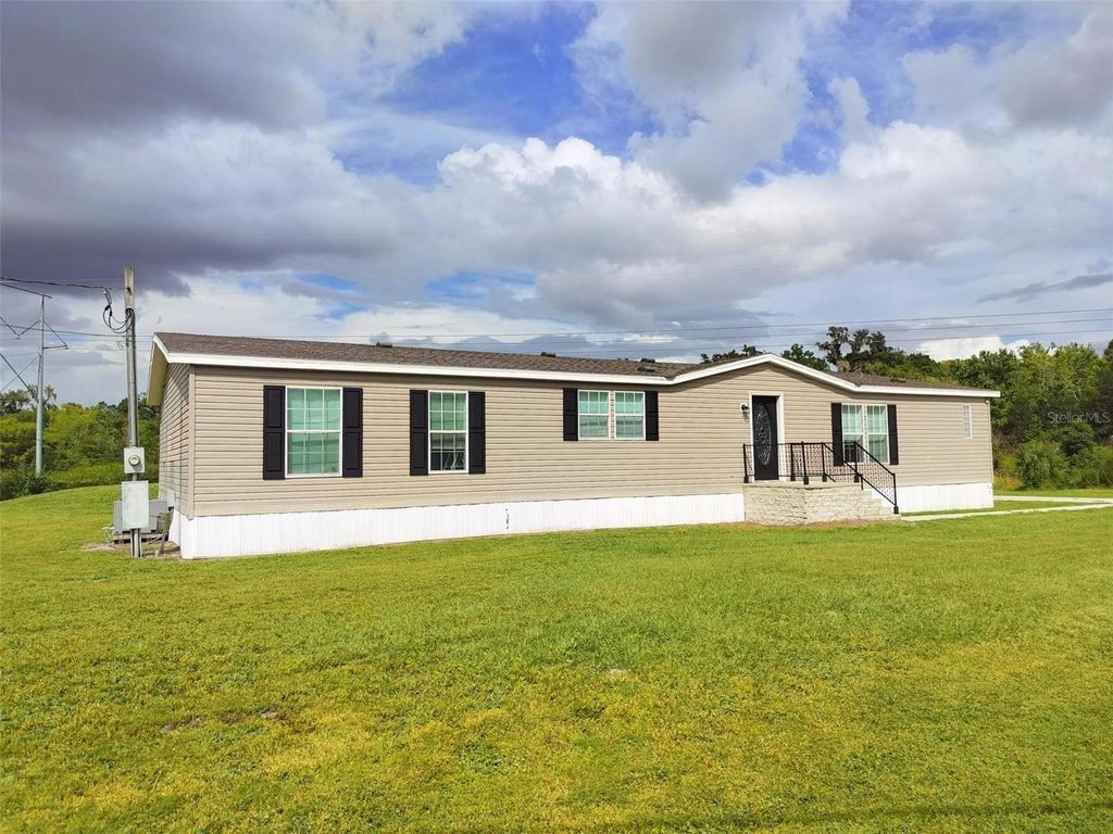 Photo of 7335 Dove Meadow Trail, Lakeland, FL 33810 (MLS # TB8439168)
