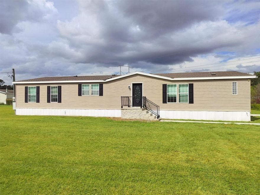 Welcome Home to this 3 bedroom/2 bath home on almost 5 Acres. LVP flooring throughout and fresh paint makes this one move-in ready! Open floor plan with living and dining areas near the kitchen, the heart of the home. Primary bath features double vanities, soaking tub and separate walk-in shower. Ample room for your outdoor toys, think RV, Boat, FUN, FUN, FUN. Enjoy the back deck for entertaining or watching the sun set. Plenty of room for a garden too. Love where you live!