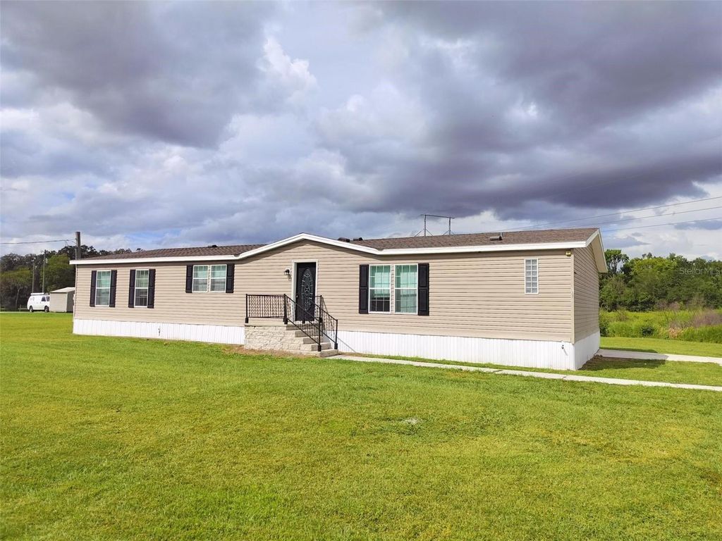Photo of 7335 Dove Meadow Trail, Lakeland, FL 33810 (MLS # TB8439168)