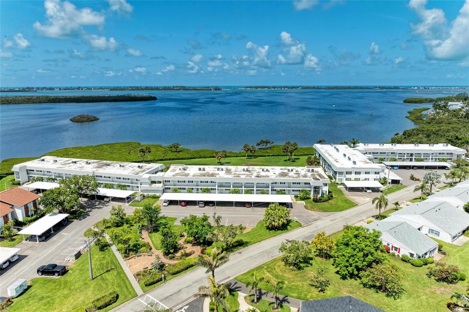 BOAT DOCKS - and so much more!
Top floor condo in an elevator building ( NO ONE ABOVE YOU) . Million 'dollar Water Views....
Mt Vernon's select water font properties overlook the inter-coastal waters of Sarasota Bay.
Assigned covered parking with outdoor storage, short walk to the amenities and only 5 miles to Our Golf Beaches.
This condo features a split bedroom floor plan and with no one above you!
Imagine waking up every morning to view a piece of paradise with a million dollar water view of Sarasota Bay.
The XL primary bedroom is spacious and features water views from your bed, large walk-in closet, updated ensuite bathroom with walk-in shower. The second bedroom is in the front of the condo along with the updated guest bathtub with shower. (BOTH BEDROOMS CAN ACCOMIDATE KING SIZE BEDS AND FURNITURE) The GREAT room combination provides flexibility for furniture placement as shown in photos. ...A Florida getaway and the American dream...from dining, entertaining, TV, birdwatching, stunning sunsets, reading a book this condo has a million-dollar view! Updated kitchen has plenty of counter space with granite counters and plenty of storage including a closet pantry and a breakfast bar, newer stainless appliances and coinvent washer and dryer. A/C 2024, Windows 2023, Hurricane Shutters 2010, ...............
COMMUNITY FEATURES: remodeled clubhouse with banquet room, billiards, ping-pong, library & game room, lakeside veranda; boat docks; heated pool; tennis & pickleball courts; shuffleboard courts; spa; sauna; workshop & wood-shop; chip & putting green; walking paths; butterfly garden; bay front park; kayak launch & storage; bayside pavilion; lakeside gazebo; bird sanctuary; tidal pond; many ponds & spacious grounds of 86 acres teaming with wonderful Florida wildlife; plus many activities & socials. Have it all just minutes by car, boat and bike from Anna Maria Island’s sugar white beaches, unique shops, & delicious dining. Start living like you're on vacation. The Mt Vernon Lifestyle knows no limits! DUES COVER: water; sewer; trash; recycle; pest control inside & outside; cable 200 channels with HD box; internet at speed of 100 with router; exterior maintenance repairs & replacement including, roof, fascia, soffit; landscape maintenance; insurance but not flood insurance.