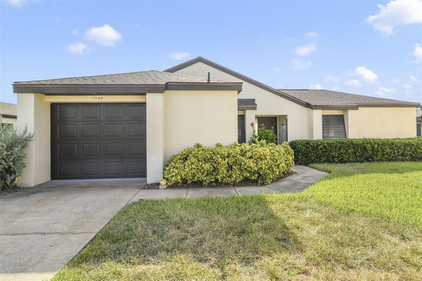Welcome to Vista Del Largo! This beautiful 2-bedroom, 2-bath condo offers an ideal combination of privacy, luxury, and convenience.
Step inside to discover a move-in-ready home with ceramic tile floors throughout—NO CARPET! The spacious open floor plan features soaring cathedral ceilings and a bright, inviting living/dining area that opens via sliding glass doors to your own private screened courtyard, perfect for grilling and growing fresh herbs.
The kitchen is equipped with stainless steel appliances, granite countertops, a stylish tile backsplash, and wood cabinets, making meal prep a pleasure.
Retreat to the primary suite, where glass sliders lead directly out to the courtyard. The split-bedroom layout provides privacy, with a guest bedroom and second bathroom that also access the courtyard. Plus, a versatile bonus room can be used as an office or additional space to meet your needs.
Additional highlights include a newer roof and an oversized one-car garage. Located just minutes from restaurants, shopping, banks, and the hospital, with easy access to Tavares Seaplane Waterfront Park—offering festivals, live entertainment, and waterfront fun!
Don’t miss out on this piece of paradise—schedule your private tour today!