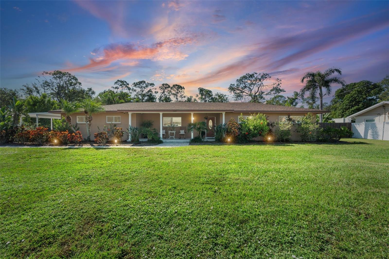 Your peaceful Bradenton retreat awaits! Set on a rare half-acre lot, this beautifully maintained 3-bedroom, 2-bath pool home offers space, privacy, and effortless Florida living. With no neighbors behind you, you’ll enjoy a sense of peace and seclusion while still being minutes from everything.
Inside, you’ll find a bright, open floor plan with neutral tones, and abundant natural light. The spacious kitchen features elegant custom cabinetry, granite countertops, and stainless-steel appliances perfect for the home chef. The living and dining areas flow to the covered lanai and pool area for easy entertaining.
The primary suite opens directly to the pool and patio, creating a true indoor-outdoor experience. Step outside to your private backyard oasis featuring a sparkling pool, paver patio, lush tropical landscaping, and even an outdoor shower, ideal for rinsing off after a swim or day at the beach.
Recent updates include a newer roof, impact doors and windows, offering peace of mind and energy efficiency. There’s plenty of room for all your toys, with space to park an RV, boat, or trailer, a two-car garage, covered carport, and storage shed.
With no HOA, this home is perfect for full-time residents, investors, or snowbirds looking for a quiet winter escape. Just minutes to downtown Bradenton, shopping, dining, and a short drive to Anna Maria Island’s world-famous beaches, this property truly offers the best of space, style, and serenity.