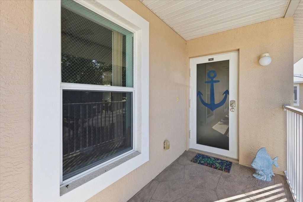 Photo of 9850 Fiddlers Green Circle #228, Rotonda West, FL 33947 (MLS # D6145803)