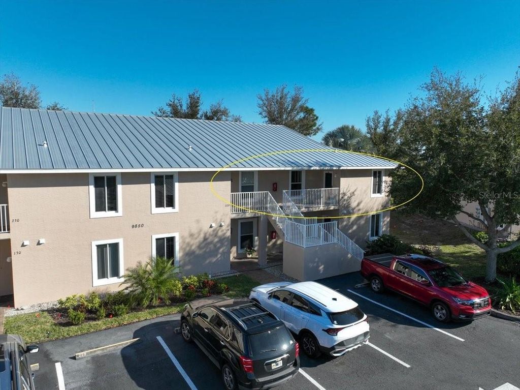 Photo of 9850 Fiddlers Green Circle #228, Rotonda West, FL 33947 (MLS # D6145803)