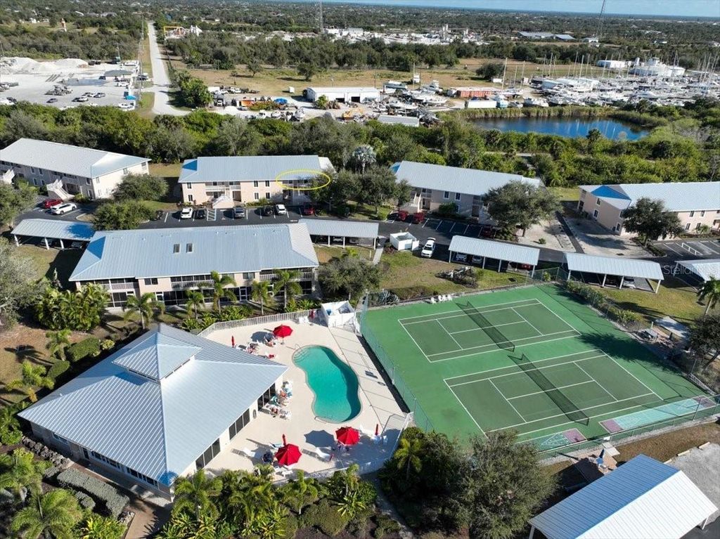 Photo of 9850 Fiddlers Green Circle #228, Rotonda West, FL 33947 (MLS # D6145803)