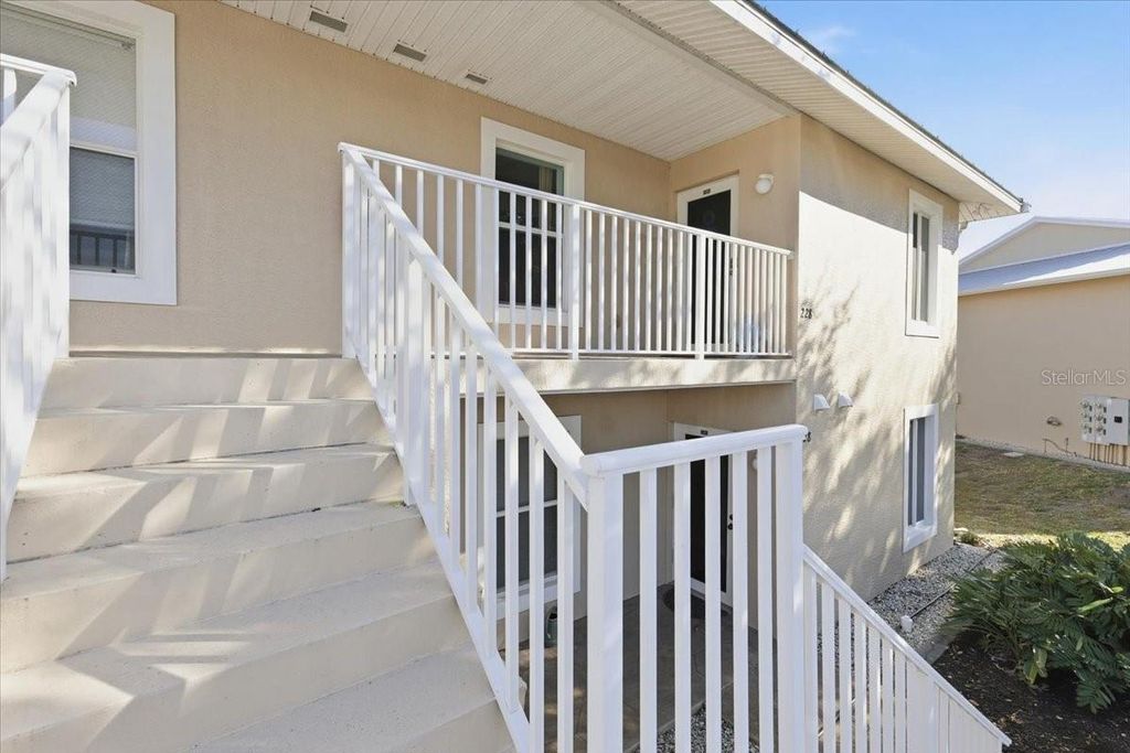 Photo of 9850 Fiddlers Green Circle #228, Rotonda West, FL 33947 (MLS # D6145803)