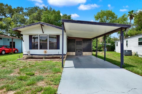 Photo of 34421 Countryside Drive, Wesley Chapel, FL 33543 (MLS # TB8524168)