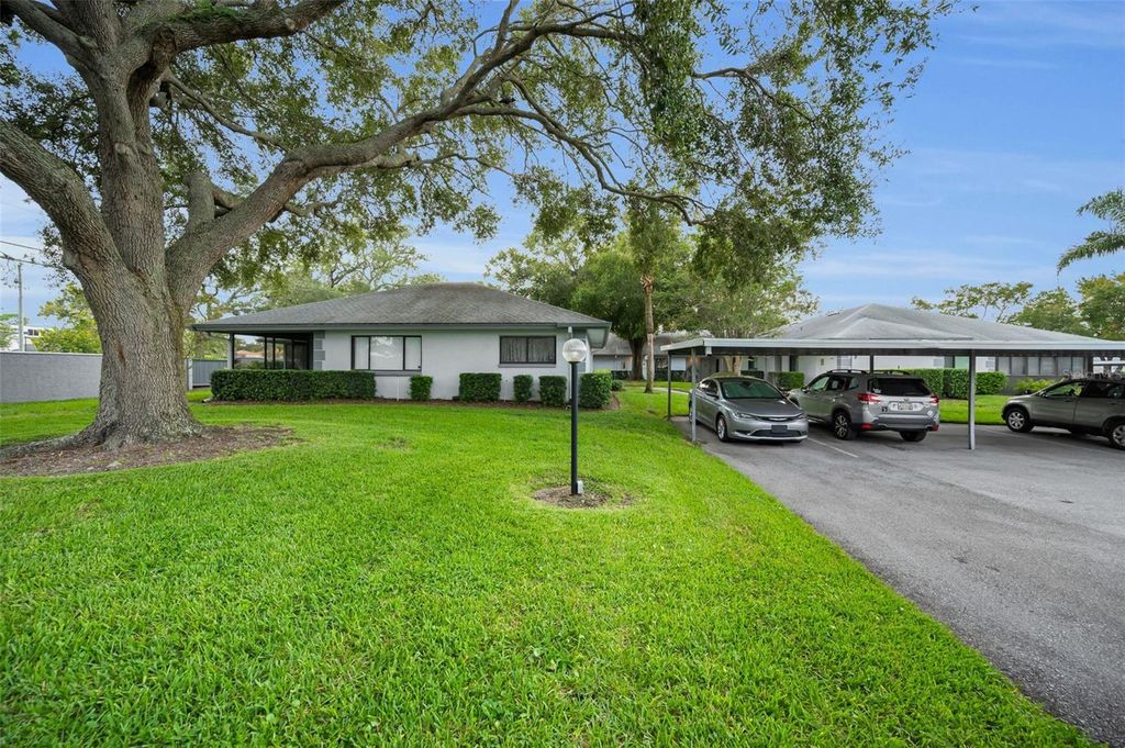 Photo of 2721 Countryside Boulevard #105, Clearwater, FL 33761 (MLS # TB8429044)