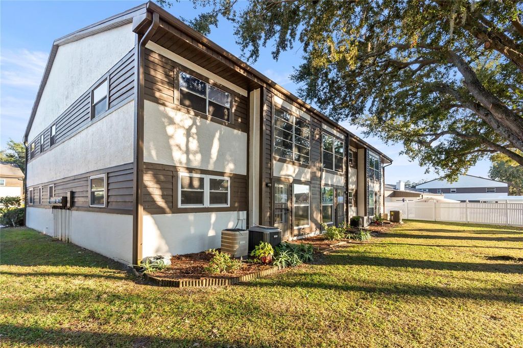 Photo of 4101 Passport Lane #103, New Port Richey, FL 34653 (MLS # TB8450476)