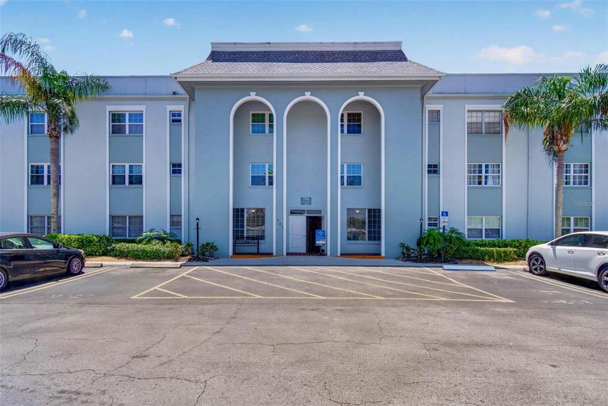 Welcome to spacious, carefree living in the highly sought-after Belleair Forest community in Belleair. This generously sized 2-bedroom, 2-bath condo offers a rare and desirable setting—one of the few residences in the community with views of the nearby Pelican Golf Club, providing a serene backdrop of lush greens and timeless Florida beauty. Step inside to find a comfortable and inviting layout, featuring hardwood flooring in the kitchen that transitions seamlessly into cozy carpeting throughout the living areas and bedrooms. Offered fully furnished, this condo is truly move-in ready—ideal as a primary residence, seasonal retreat, or investment opportunity. Enjoy the ease of maintenance-free living with an impressive list of community amenities, including a private heated pool, clubhouse, grilling area, library, and assigned covered parking. The comprehensive HOA covers water, trash, building insurance, internet, Wi-Fi, cable TV, roof, exterior maintenance, and lawn care—allowing you to focus on enjoying your surroundings. Perfectly positioned just minutes from shopping, dining, and the stunning Gulf beaches, this Belleair gem combines comfort, convenience, and a coveted golf course view in one exceptional offering.