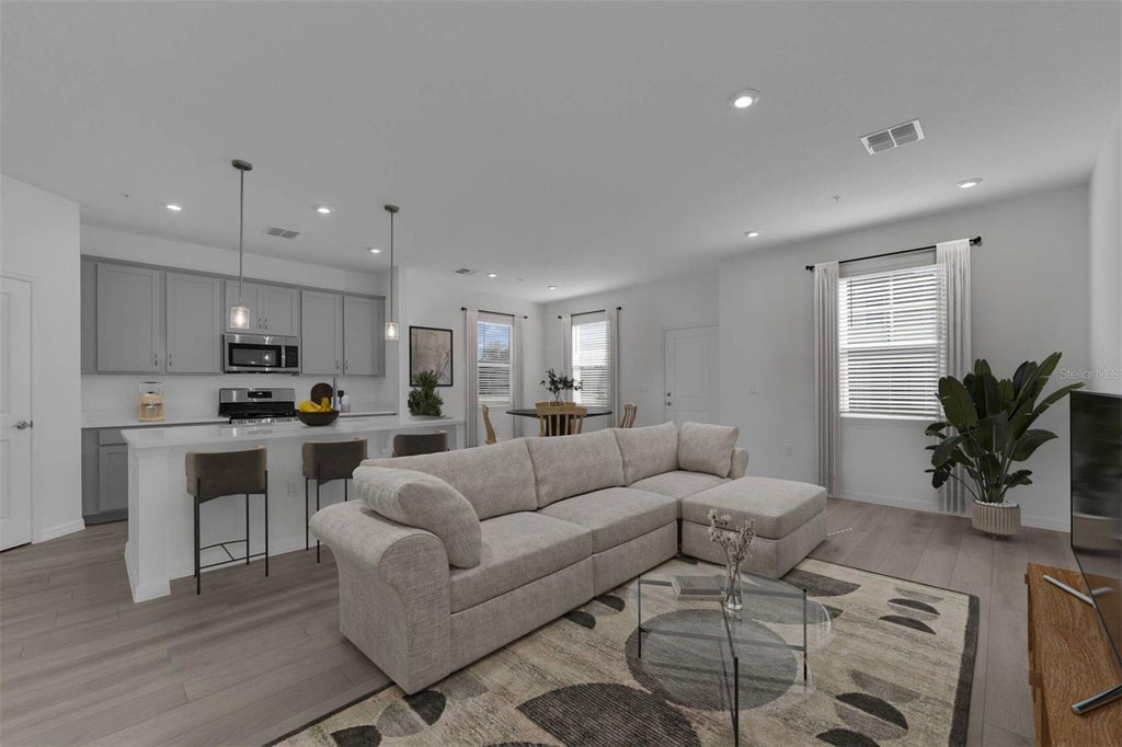 Photo of 1853 Horsetail Drive, Saint Cloud, FL 34771 (MLS # O6451581)