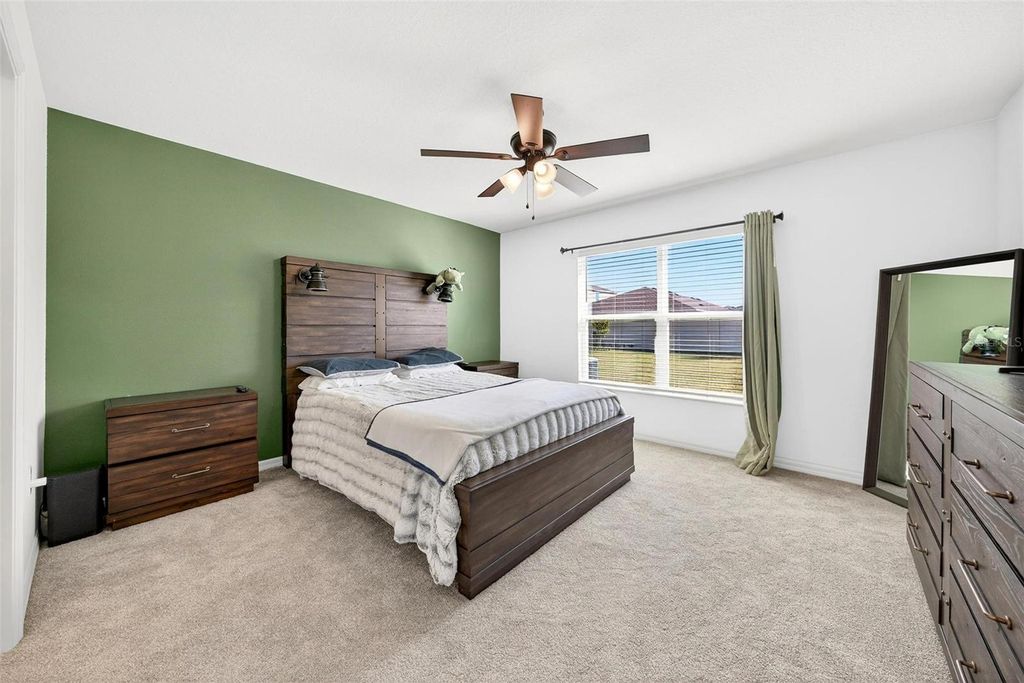 Photo of 232 Summerlin Loop, Haines City, FL 33844 (MLS # O6361115)