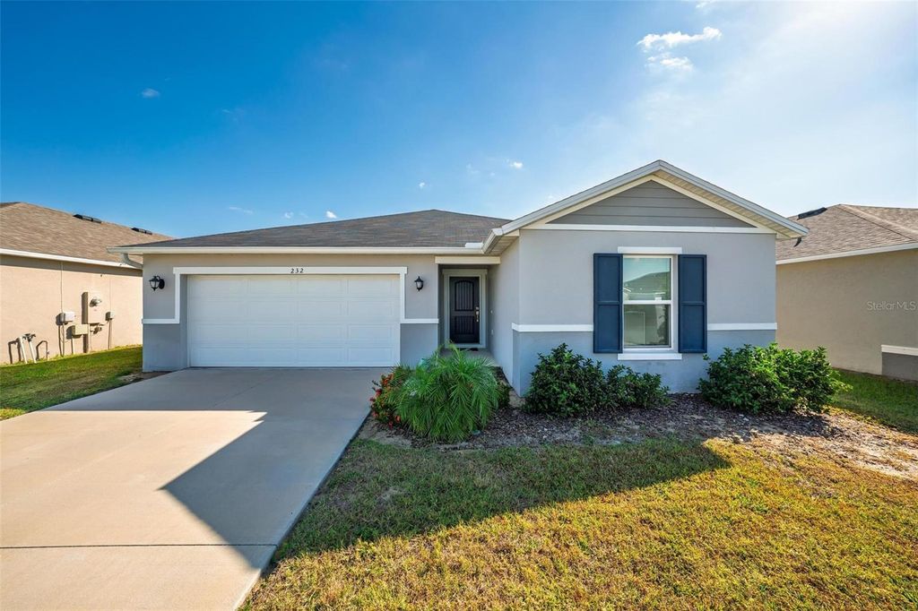 Photo of 232 Summerlin Loop, Haines City, FL 33844 (MLS # O6361115)