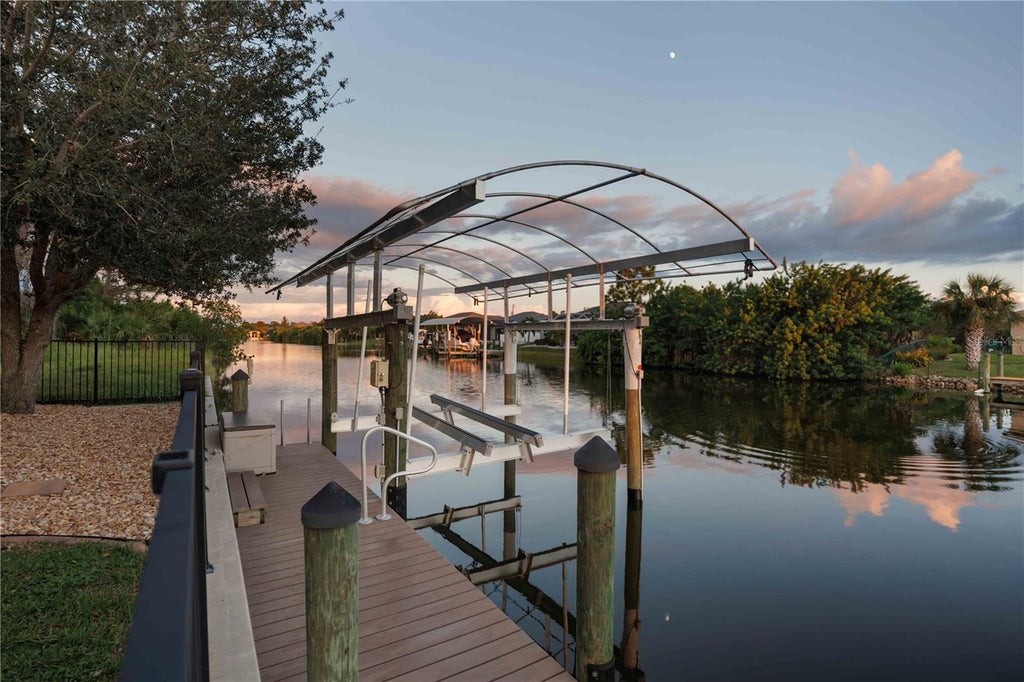 Photo of 15392 Aldama Circle, Port Charlotte, FL 33981 (MLS # D6148821)